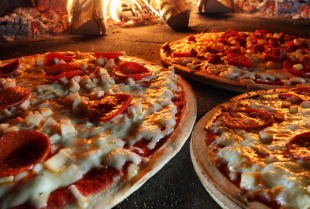 Czemu warto poznać wyjątkowy smak pizzy serwowanej w sprawdzonej Pizzerii Mariusza Wolańskiego?